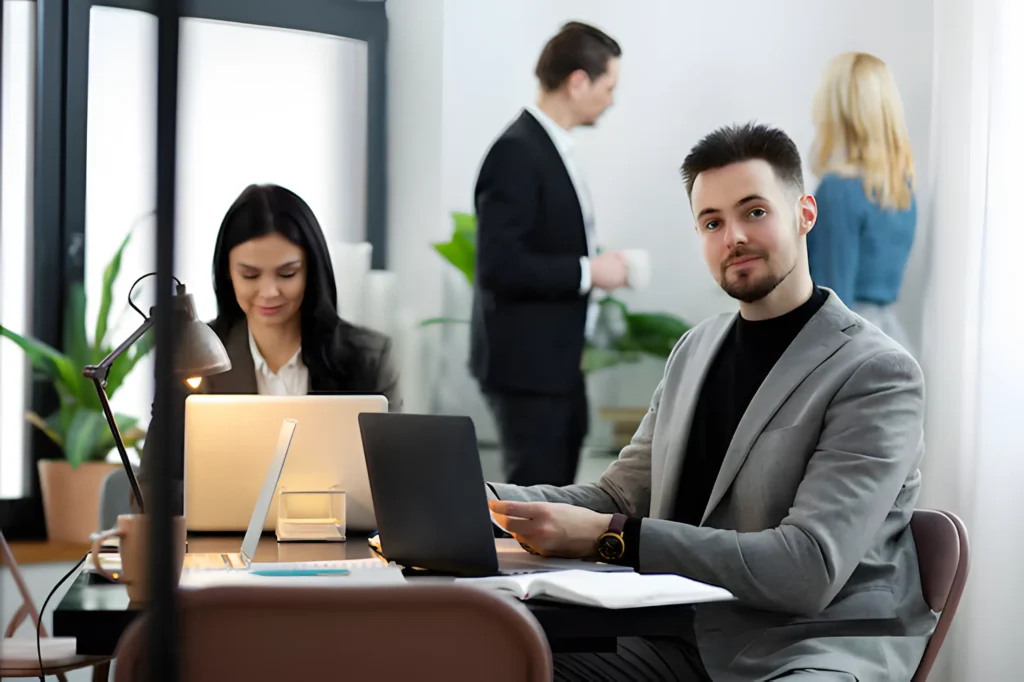 Businessman working on laptop in modern office